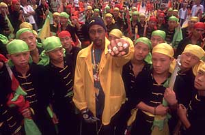 Rza surrounded by children